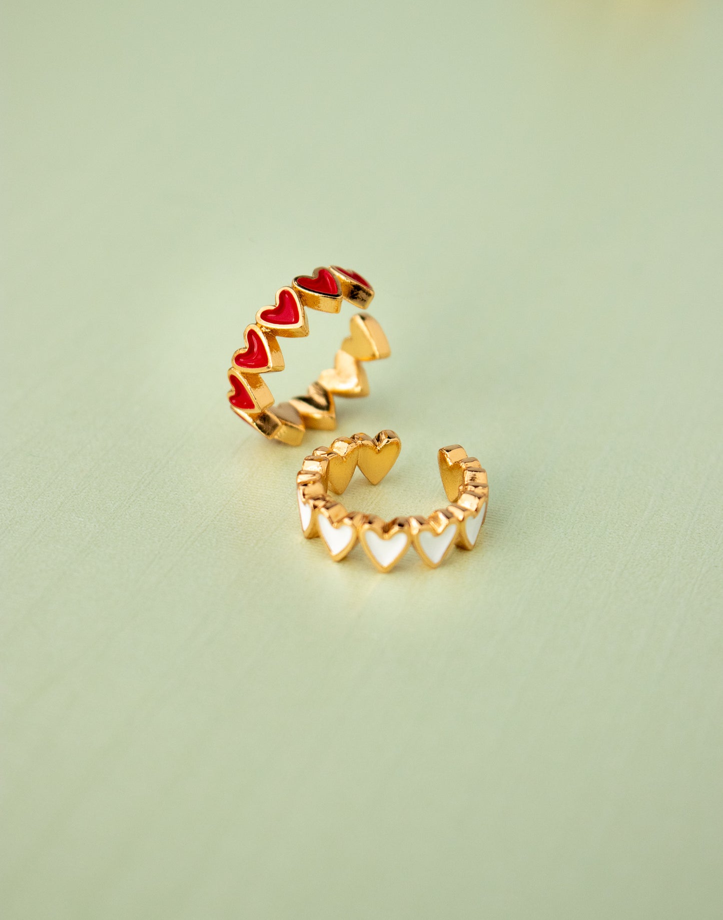 Setx2 earcuff multicorazones.