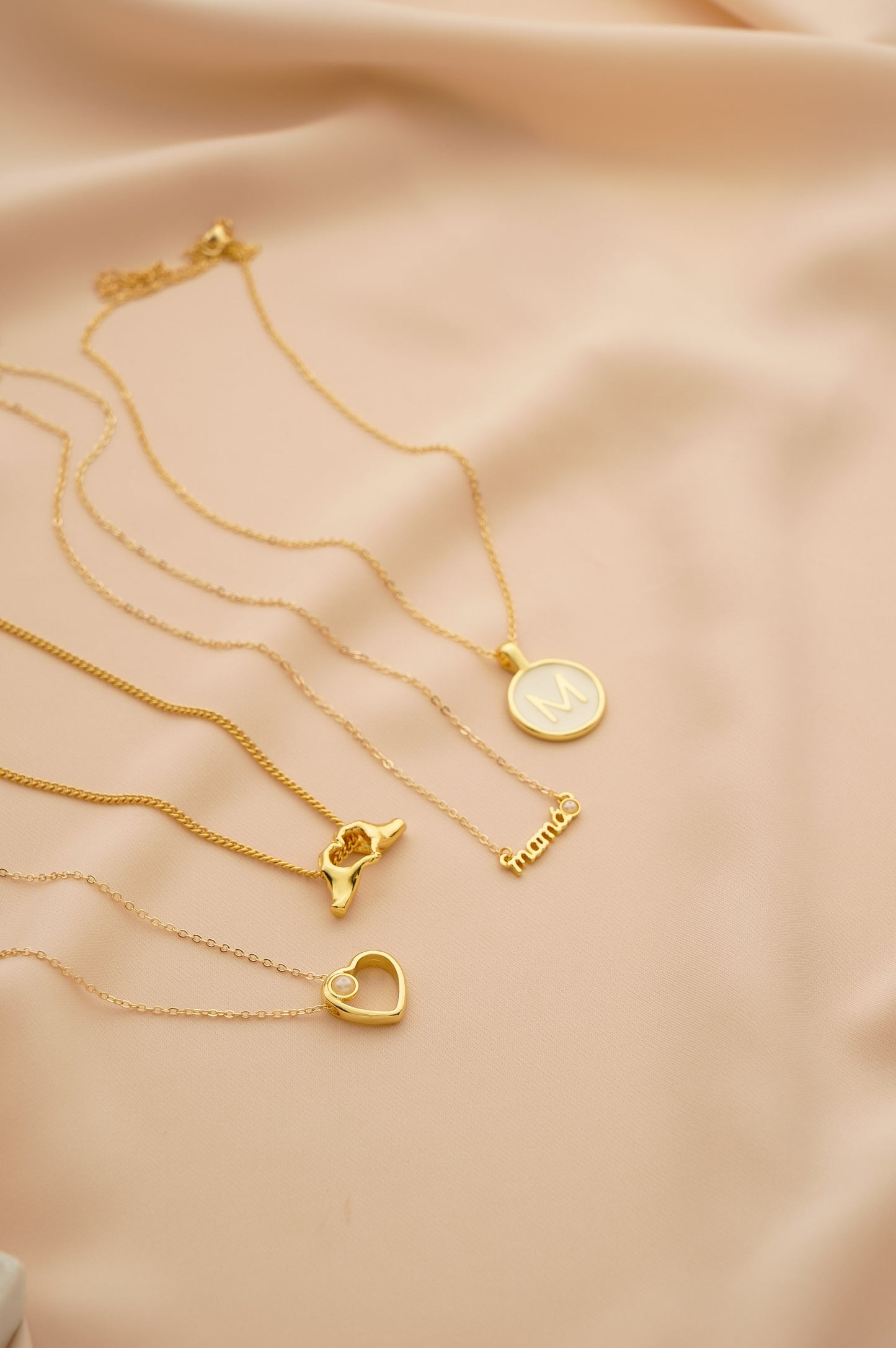 Collar de corazón para mamá.