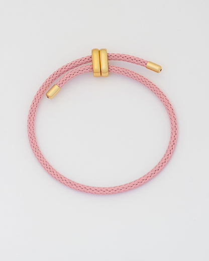 Pulsera personalizable rosa.