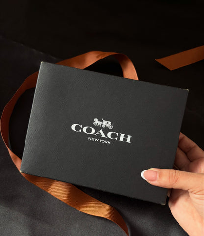 Billetera “Essential Slim” COACH
