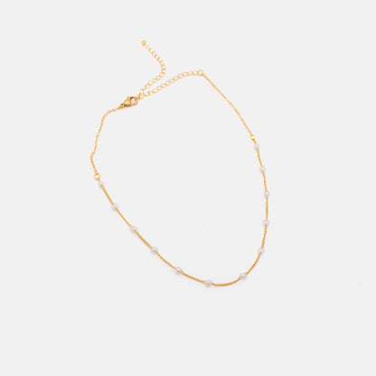 Cadena choker de perlas.