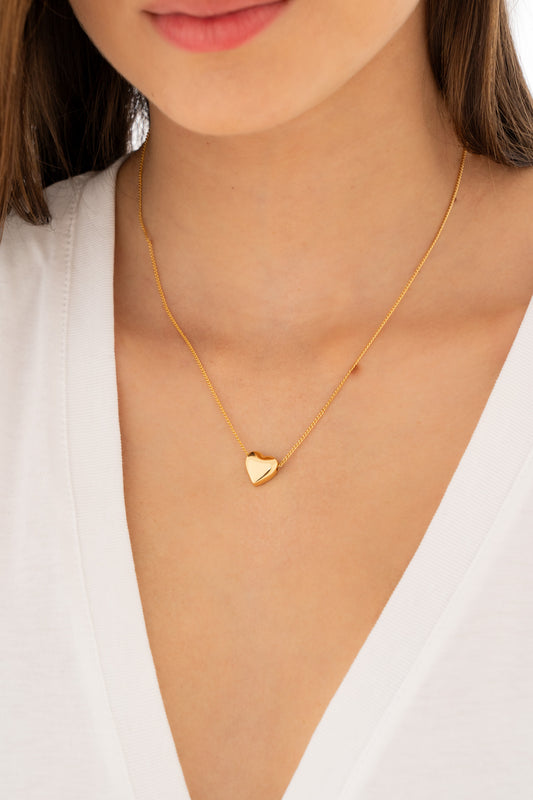 Set collar con dije de corazón + aretes.